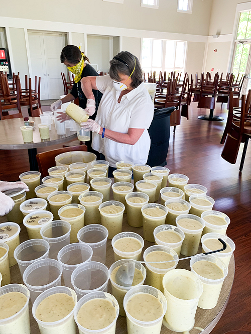 Soup being distributed-Profiles in Service-UGK Community First